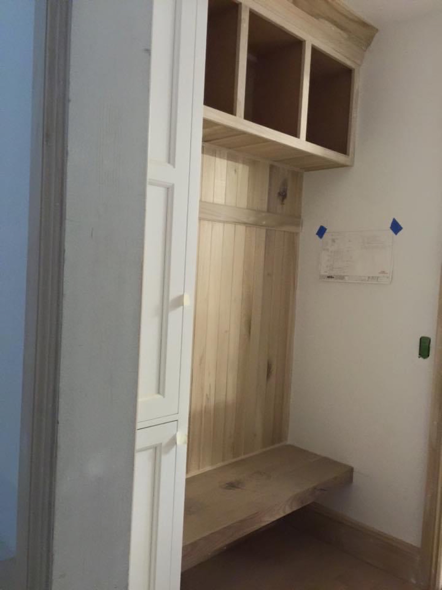 Mudroom bench with bead-board back