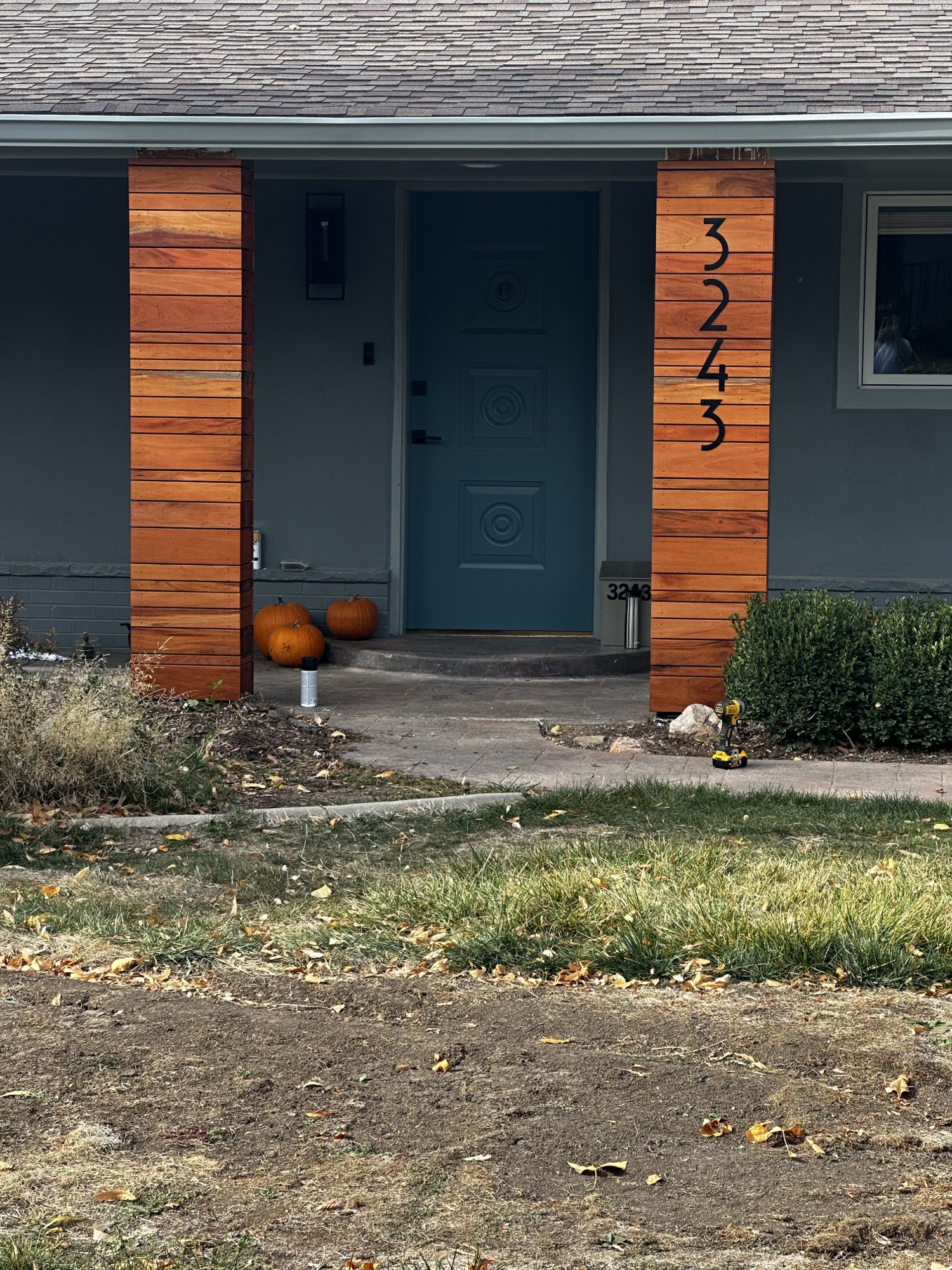 Mid-century entry with slat columns
