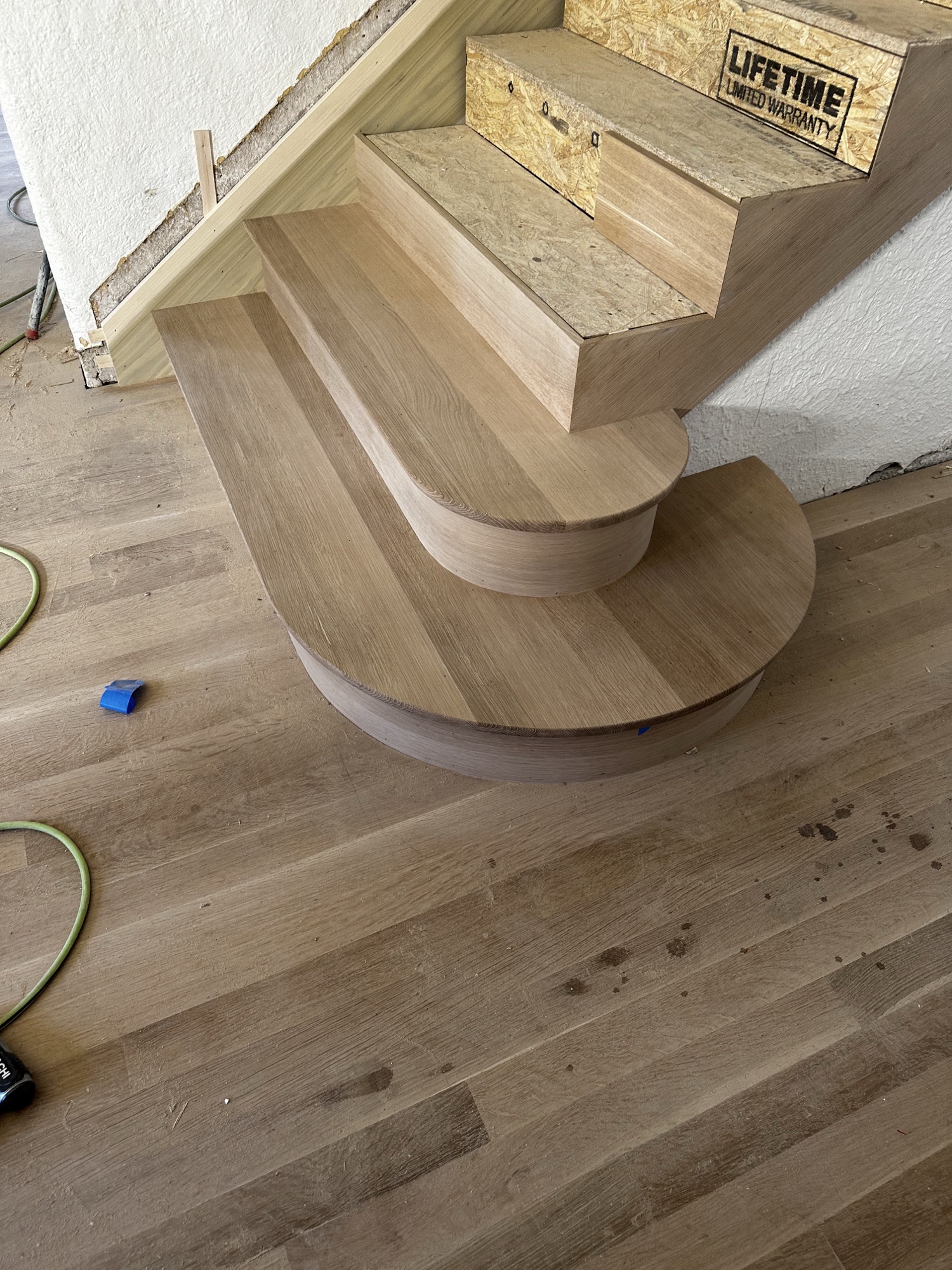 Curved white oak starter step landing