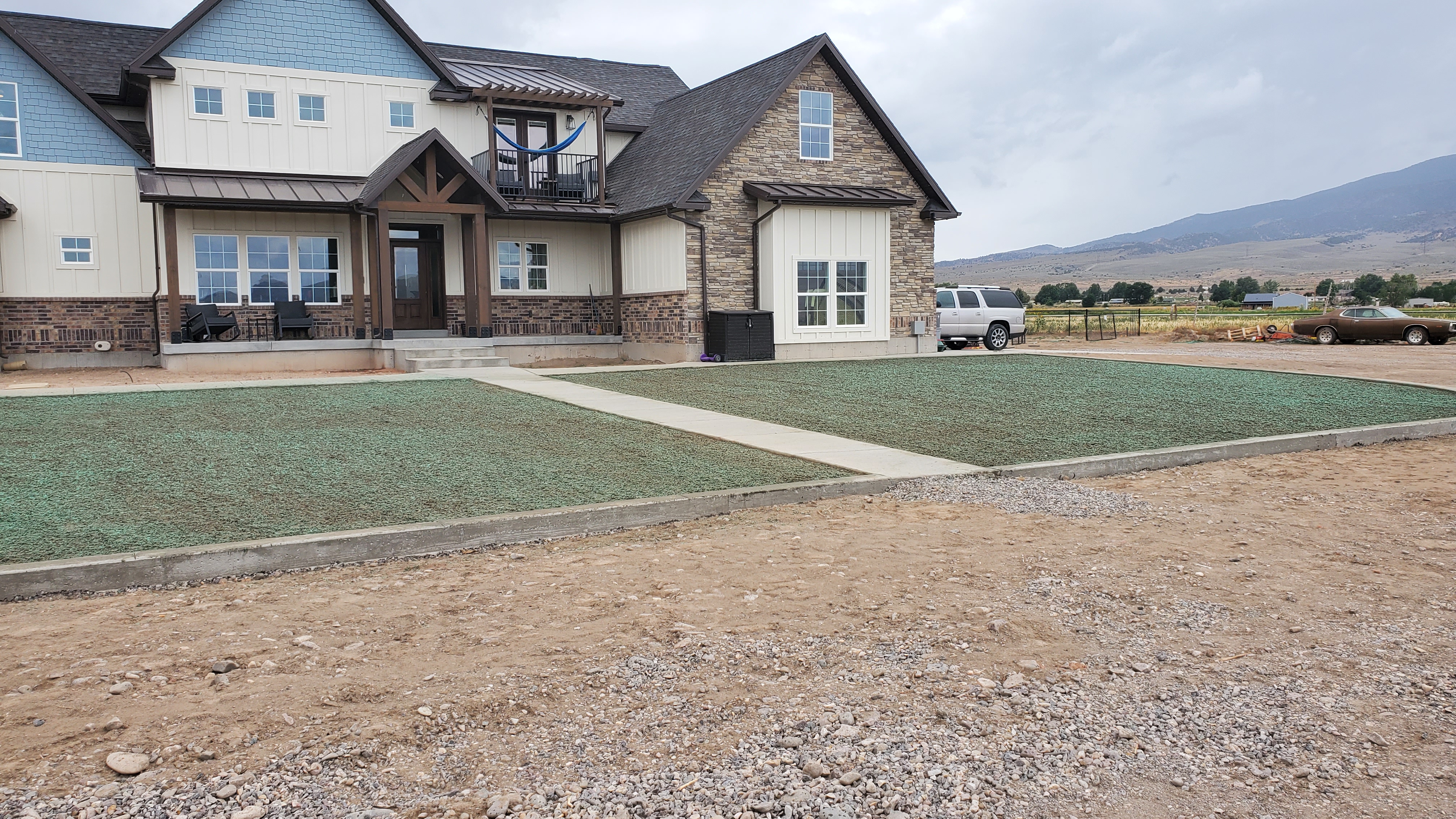 Hydroseeded Kentucky Blue Grass lawn installation