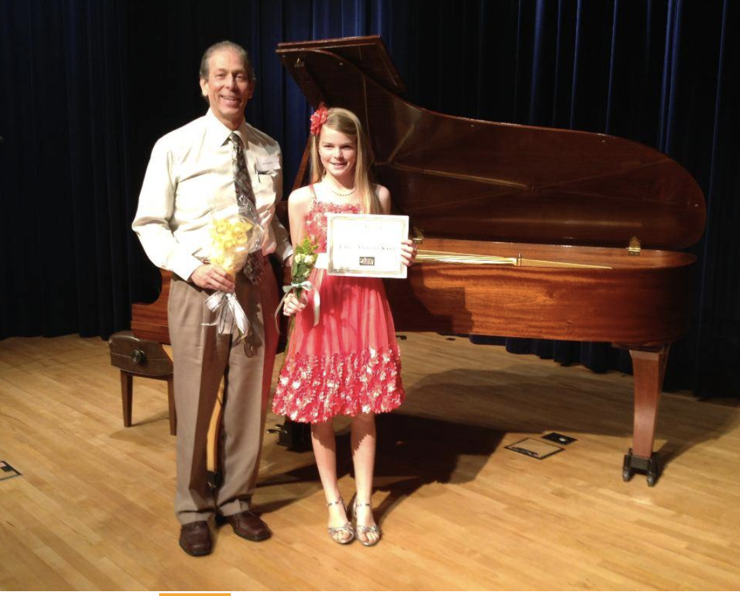 Student preparing for piano recital performance